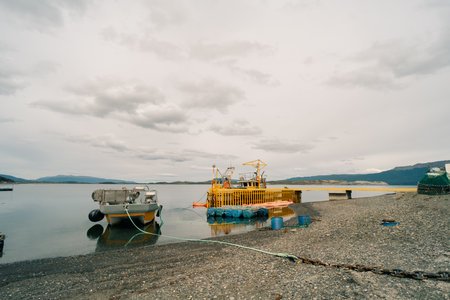 Ushuaia, Argentina - Dec 2th 2023 Rustic fishboats parked at puerto almanza port,. High quality photoのeditorial素材