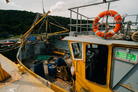 Ushuaia, Argentina - Dec 2th 2023 Rustic fishboats parked at puerto almanza port,. High quality photoのeditorial素材