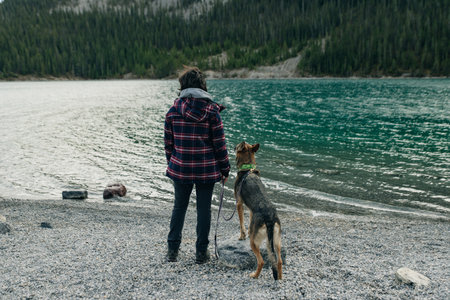 girl with her dog in the national park. High quality photo