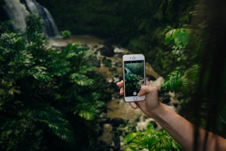 photo shooting on smartphone in tourist journey. High quality photoの写真素材