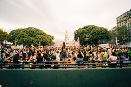 Women chant slogans during the Ni Una Menos march for International Womens Day, outside the Argentine Congress in Buenos Aires, argentina - March 8, 2024のeditorial素材