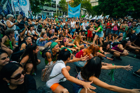 Women chant slogans during the Ni Una Menos march for International Womens Day, outside the Argentine Congress in Buenos Aires, argentina - March 8, 2024のeditorial素材