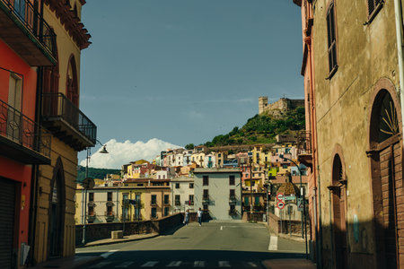 Italy, Bosa, may 1, 2024 old beautiful Italian street with colorful houses. High quality photoのeditorial素材
