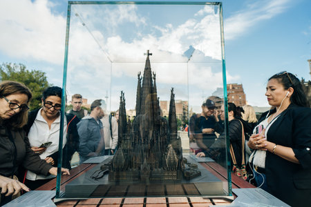 model sagrada de familia with tourists, spain - may 2 2024. High quality photo