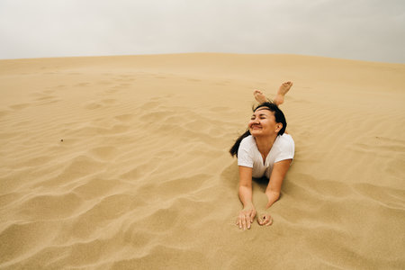 girl in white dress in desert. High quality photoの写真素材