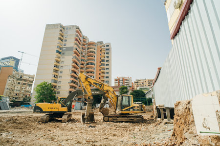 excavators in the city center. tirana, albania - may 2 2024. High quality photo