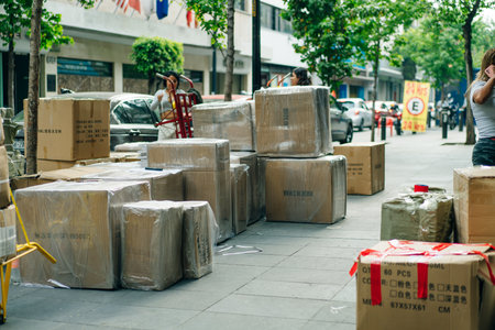 delivery boxes on the street in downtown in mexico city, Mexico - Dec 2th 2023. High quality photoのeditorial素材