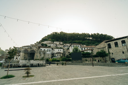 BERAT, ALBANIA, April 13, 2024: Berat castle viewed from boulevard Republika in Albania. High...