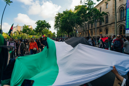 barcelona, spain - 7 May 2024: Attending a peaceful demonstration defending Palestine. High quality photoのeditorial素材