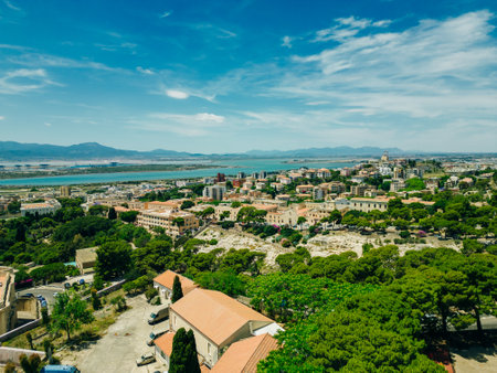 CAGLIARI, SARDINIA, ITALY - JULY 2 2024 Aerial shot over Cagliari cityscape on a beautiful day. High quality photoの写真素材