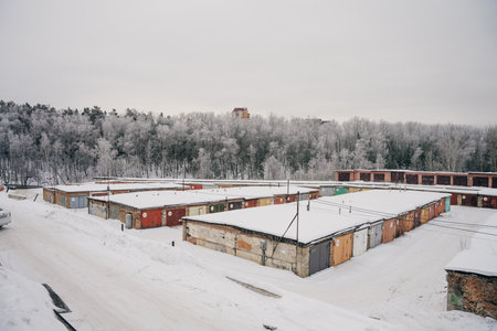 garages covered in snow in russia in winter. High quality photoの写真素材