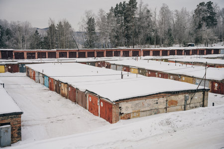 garages covered in snow in russia in winter. High quality photoの写真素材