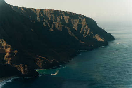Hawaii Kauai Na Pali coast landscape aerial view from helicopter. Nature coastline dramatic mountains with secluded popular tourist attraction beach. USA destination. High quality photoの写真素材