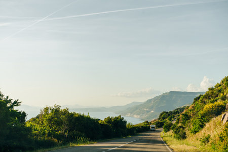 Panoramic view of beautiful landscape of Supramonte Mountains with green hills, trees and mediterranean forest vegetation. Ogliastra, Sardinia, Italy. . High quality photoの写真素材