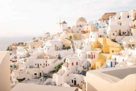 Fira town by the sea on mountain coast of Santorini island in Greece - May 2, 2024. High quality photoの写真素材