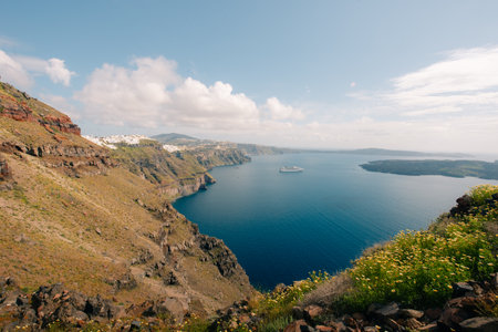 Skaros Rock at Imerovigli village with volcanic island Nea Kameni in background, Santorini, Greece. High quality photoの写真素材