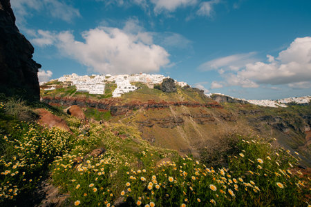 Skaros Rock at Imerovigli village with volcanic island Nea Kameni in background, Santorini, Greece. High quality photoの写真素材