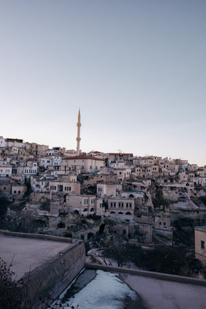 Ancient town and a castle of Uchisar dug from a mountains after sunrise, Cappadocia, Turkey. High quality photoの写真素材