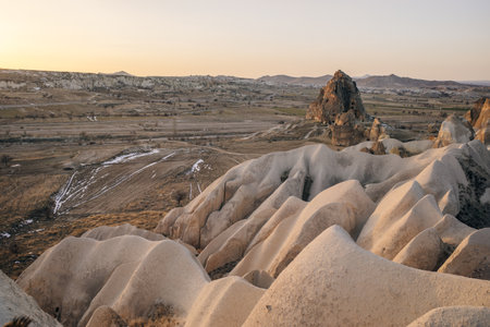 Stunning view of some rock formations in the Red and Rose Valley in Cappadocia during a beautiful sunset. Goreme, central Antolia, Turkey. High quality 4k footageの写真素材