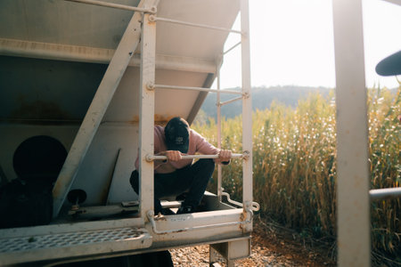 man climbing on freight train, High quality photo