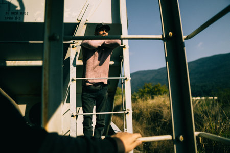 man climbing on freight train,. High quality photoの写真素材