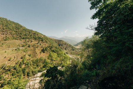 Terraced farming in Nepal. Village on a terraced hill during Annapurna Circuit Trek in Himalayas, Annapurna Conservation Area, Nepal. Rise fields. Agricultural concept. High quality photoの写真素材