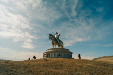 The majestic equestrian statue of Genghis Khan, also known as Chinggis Khaan or Temujin, located in Mongolia. Made of stainless steel, the monument depicts the great military leader on horseback, symbolizing strength, leadershipの写真素材