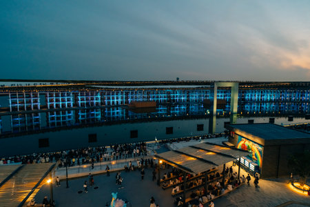 Osaka-Kansai, Japan - May 2, 2025 Visitors watch a water and light display. High quality photo
