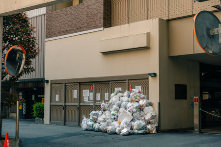white garbage bags on Osaka street, Japan. High quality photo