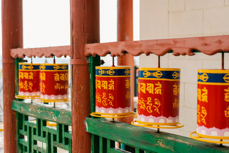 Close-up of many Tibetan prayer wheels spinning in slow motion, Mongolia. High quality photoの写真素材