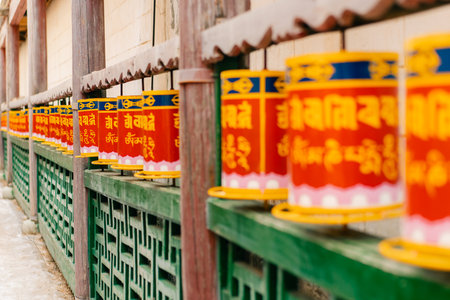 Close-up of many Tibetan prayer wheels spinning in slow motion, Mongolia. High quality photoの写真素材