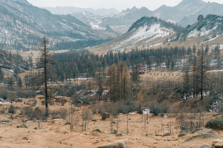 snowy Mongolian mountains, surrounded by serene nature. . High quality photoの写真素材