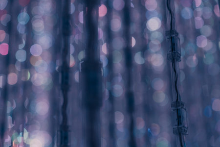 Garlands lights white glitter hanging vertical lines rain confetti. High quality photo