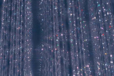 Garlands lights white glitter hanging vertical lines rain confetti. High quality photo