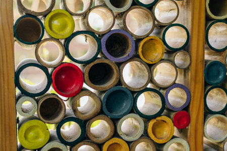 bamboo partition painted with multicolored paint. High quality photoの写真素材