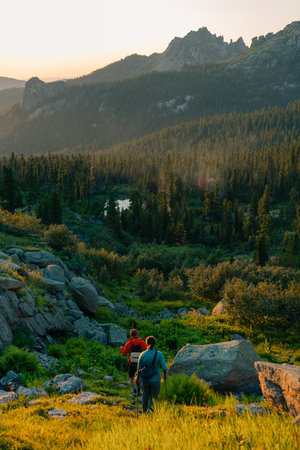 ergaki - 4 August 2025 backpacker on the path in the mountain. High quality photoの写真素材