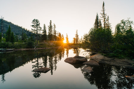 - 4 August 2025 Sunset on a mountain lake. High quality photo