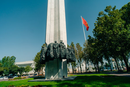Detail of the national flag of Kyrgyzstan waving in the wind on a clear day. High quality 4k footageの写真素材