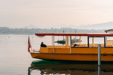 yellow Ferry in Villeneuve on Lake Geneva, Vaud, Switzerland, Europe - 2 Oct 2025. High quality photoの写真素材