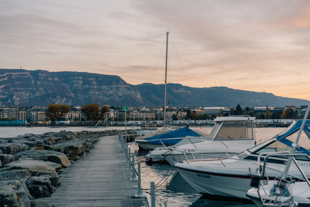 Geneva, Switzerland - Sep 1 2025 luxurious and expensive yachts are docked in a harbor on lake Geneva. High quality photoのeditorial素材