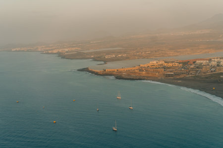 Elevated views from the volcanic peak Montana Roja towards the natural beach Playa de la Tejita in Tenerife, Canary Islands, Spain. High quality photoの写真素材