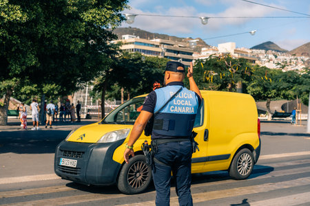 tenerife, canary islands, Spain - Dec 1 2025 Service vehicles for the local police. High quality photoのeditorial素材