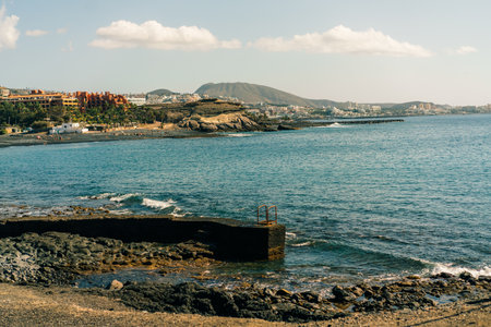 View of palm trees, and beautiful buildings of Spanish architecture, in La Caleta, Tenerife, Spain. High quality photoの写真素材