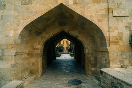 Baku, Azerbaijan - 1 Dec 2025 View of the Gosha Gala Paired Fortress Gates and the ancient city walls of Icherisheher, a historic landmark in Baku, Azerbaijan.の写真素材