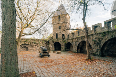 Historical city gate Helpoort with parts of the old city wall in Maastricht, Netherlands - 1 Oct 2025. High quality photoの写真素材