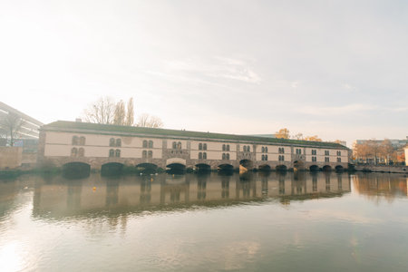 Strasbourg, France. Vauban Dam - A 17th-century spillway and bridge made of pink sandstone with ancient sculptures. Quarter of Petite Franceの写真素材