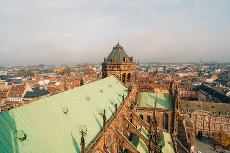 The roof of Notre Dame de Strasbourg with city in background. Strasbourg France - 1 Oct 2025. High quality photoの写真素材