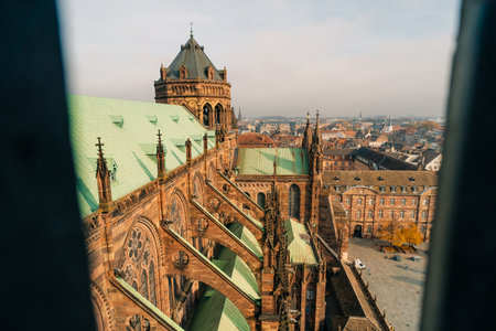 The roof of Notre Dame de Strasbourg with city in background. Strasbourg, France - 1 Oct 2025. High quality photoの写真素材