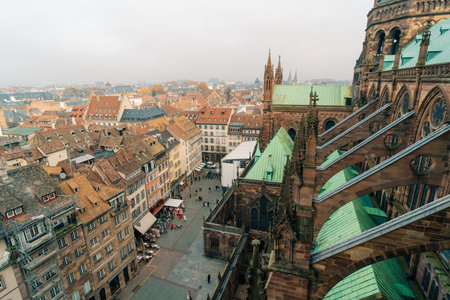 The roof of notre dame de Strasbourg with city in background.strasburg france - 1 Oct 2025. High quality photoの写真素材