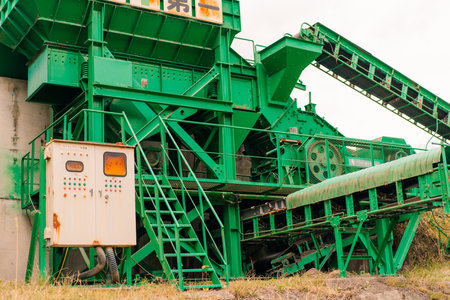 industrial crushing and screening equipment, probably a mobile or stationary crushing plant in...